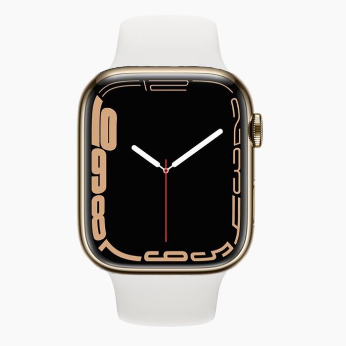 Apple Watch Series 7 45 mm acier inoxydable doré 4G avec bracelet sport blanc